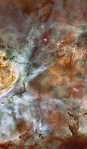 A foto mostrava a região do Cluster NGC 3532, perto da nebulosa Carina (que você vê na imagem, também do Hubble).