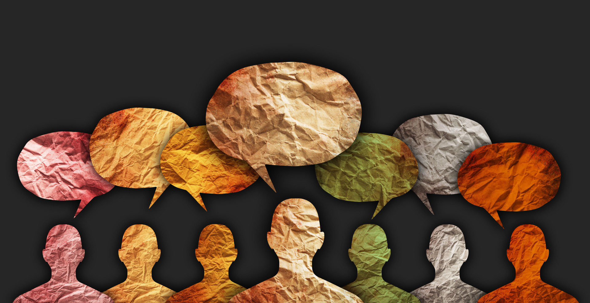 Diverse cultures, international communication concept. Human silhouette with speech bubbles. (Foto: Adobestock)