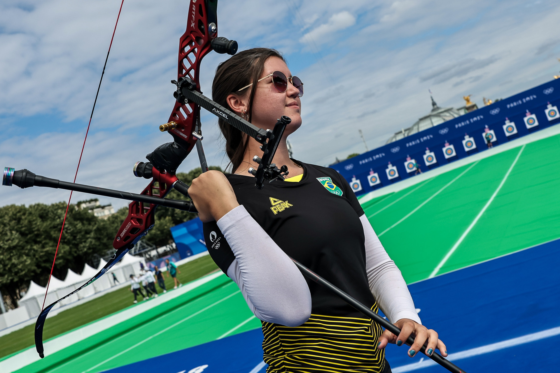 ￼ANA Luiza foi a primeira brasileira em ação nos Jogos (Foto: Miriam Jeske/COB)