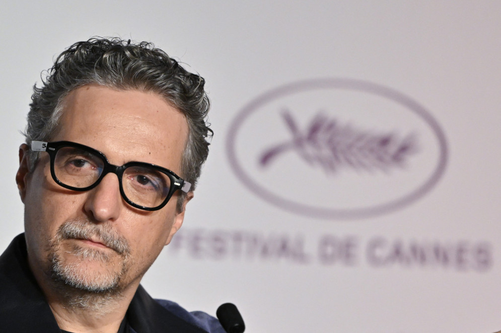O roteirista do O POVO, Arthur Gadelha, entrevistou o cineasta Kleber Mendonça Filho em Cannes (França) nessa terça-feira, 20(Foto: AFP)