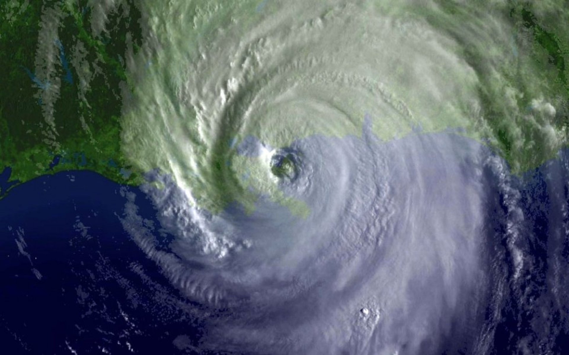 ParaTodosVerem: Uma imagem de satélite mostra o furacão Katrina no momento em que ele atingiu a costa dos Estados Unidos, em 29 de agosto de 2005 (Foto: National Oceanic and Atmospheric Administration (NOAA) / AFP)